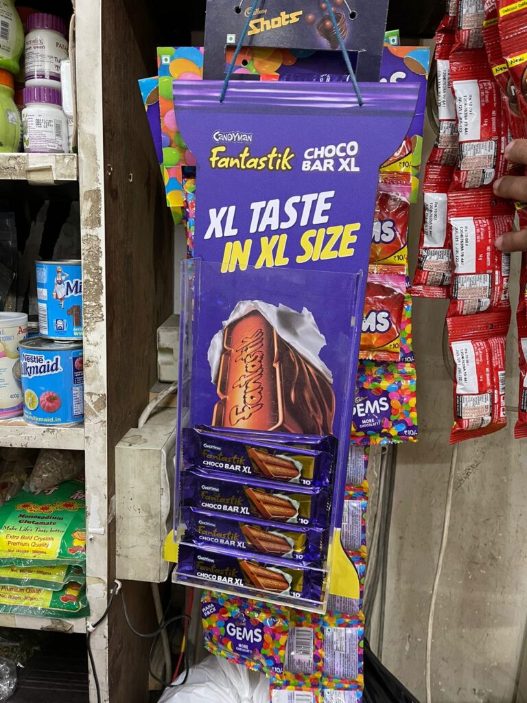Cadbury POSM: Purple chocolate display with XL Taste XL Size campaign - made by Beyond Retail